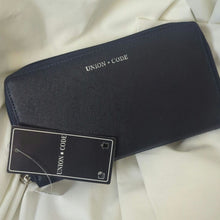 Load image into Gallery viewer, NWT Textured Black Leather RFID Data Safe Wallet Pink Interior
